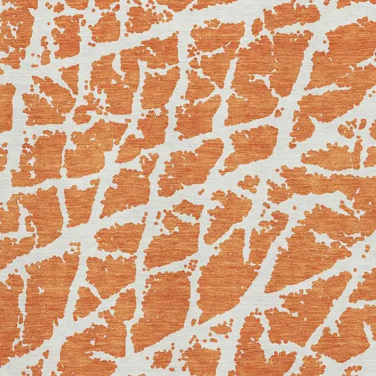 Orange And Ivory Abstract Washable Area Rug With UV Protection Photo 3