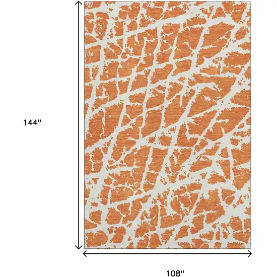 Orange And Ivory Abstract Washable Area Rug With UV Protection Photo 3