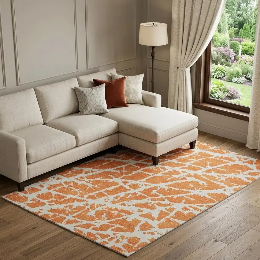 Orange And Ivory Abstract Washable Area Rug With UV Protection Photo 1