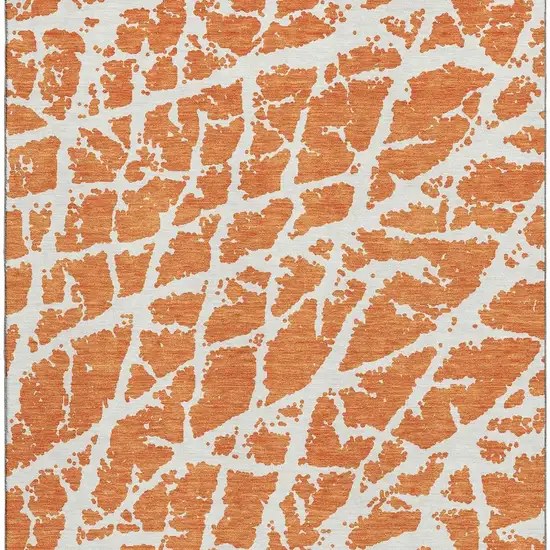 Orange And Ivory Abstract Washable Area Rug With UV Protection Photo 4