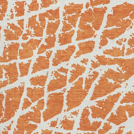 Orange And Ivory Abstract Washable Area Rug With UV Protection Photo 3