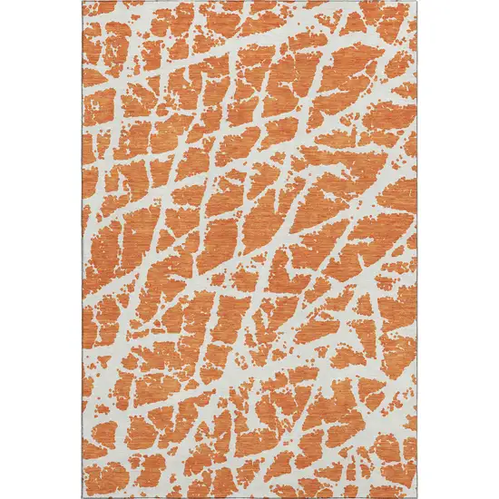 Orange And Ivory Abstract Washable Area Rug With UV Protection Photo 1