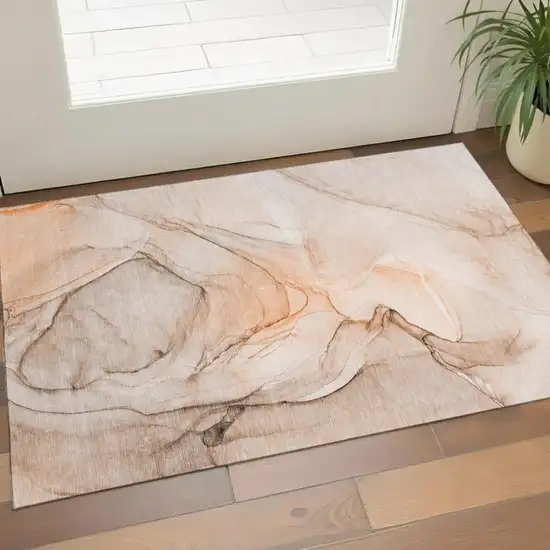 Orange And Ivory Abstract Washable Area Rug With UV Protection Photo 1
