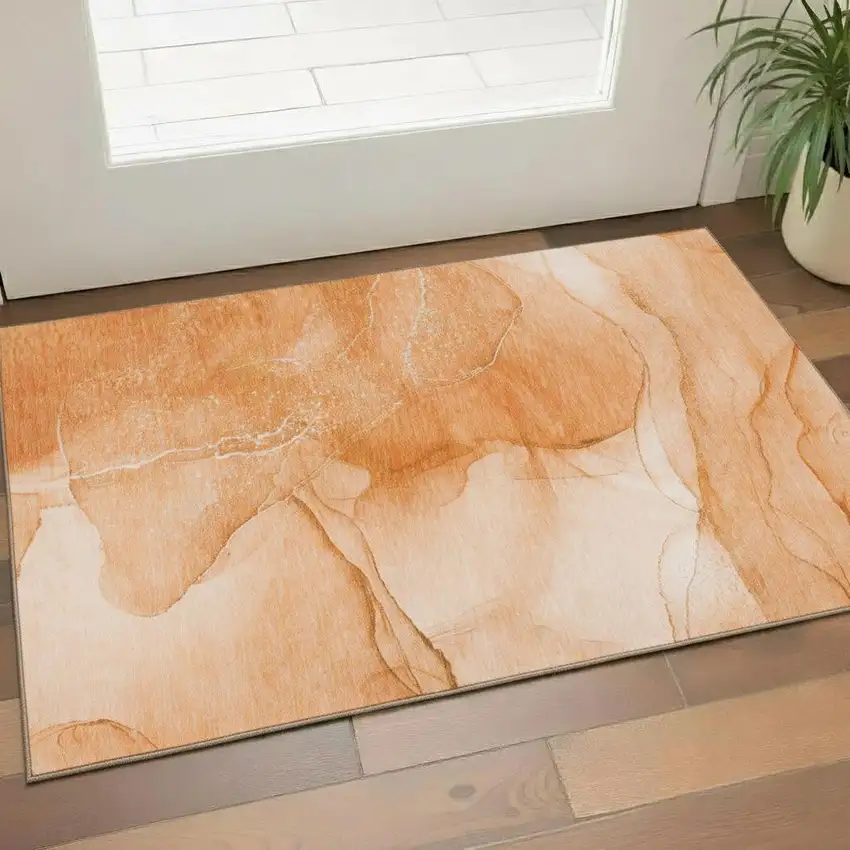 Orange And Ivory Abstract Washable Area Rug With UV Protection Photo 2