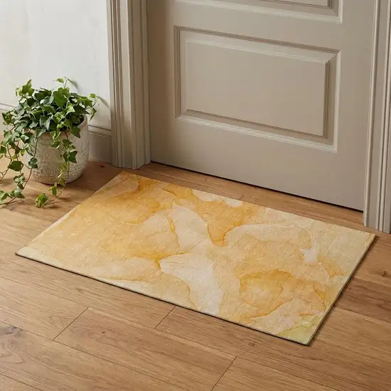 Orange And Ivory Abstract Washable Area Rug With UV Protection Photo 1