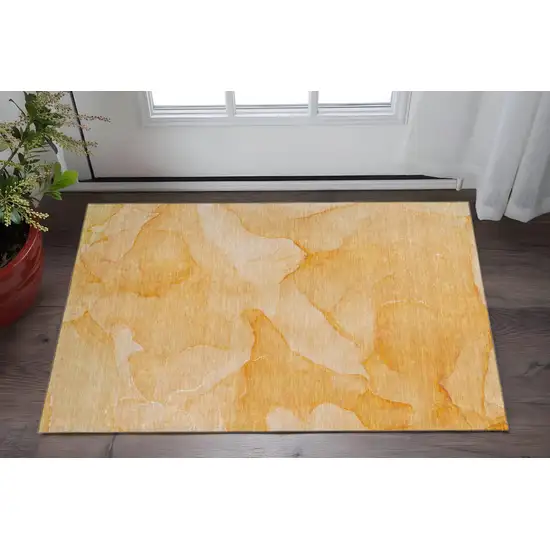 Orange And Ivory Abstract Washable Area Rug With UV Protection Photo 2
