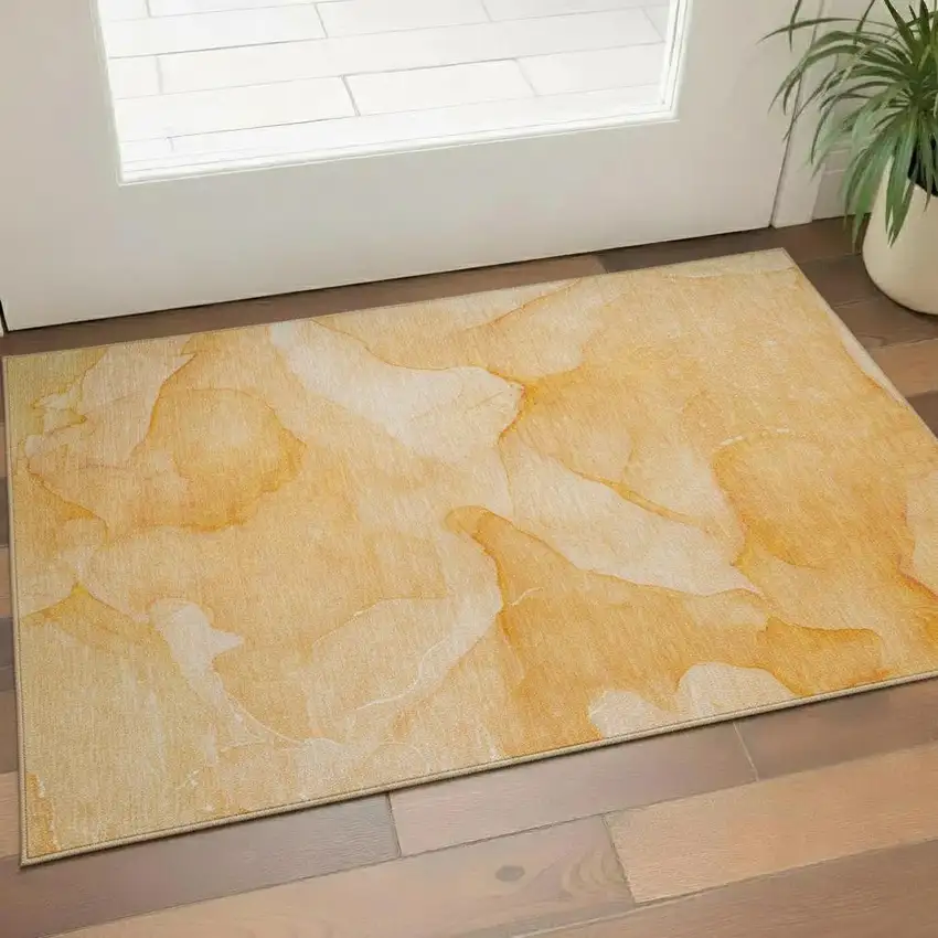 Orange And Ivory Abstract Washable Area Rug With UV Protection Photo 1