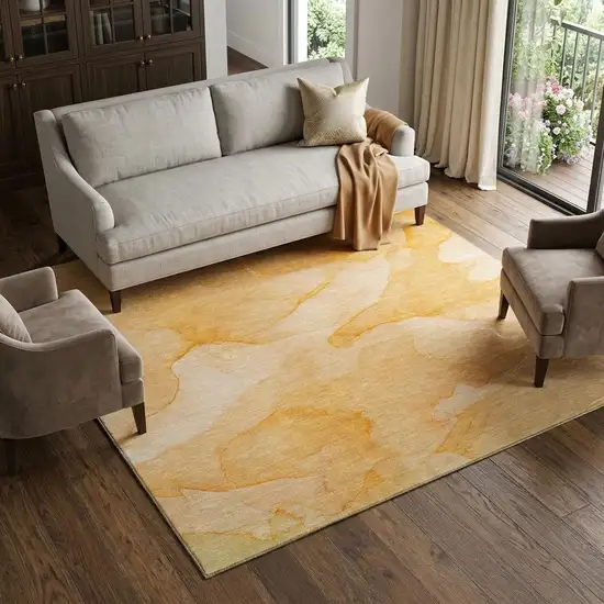 Orange And Ivory Abstract Washable Area Rug With UV Protection Photo 1