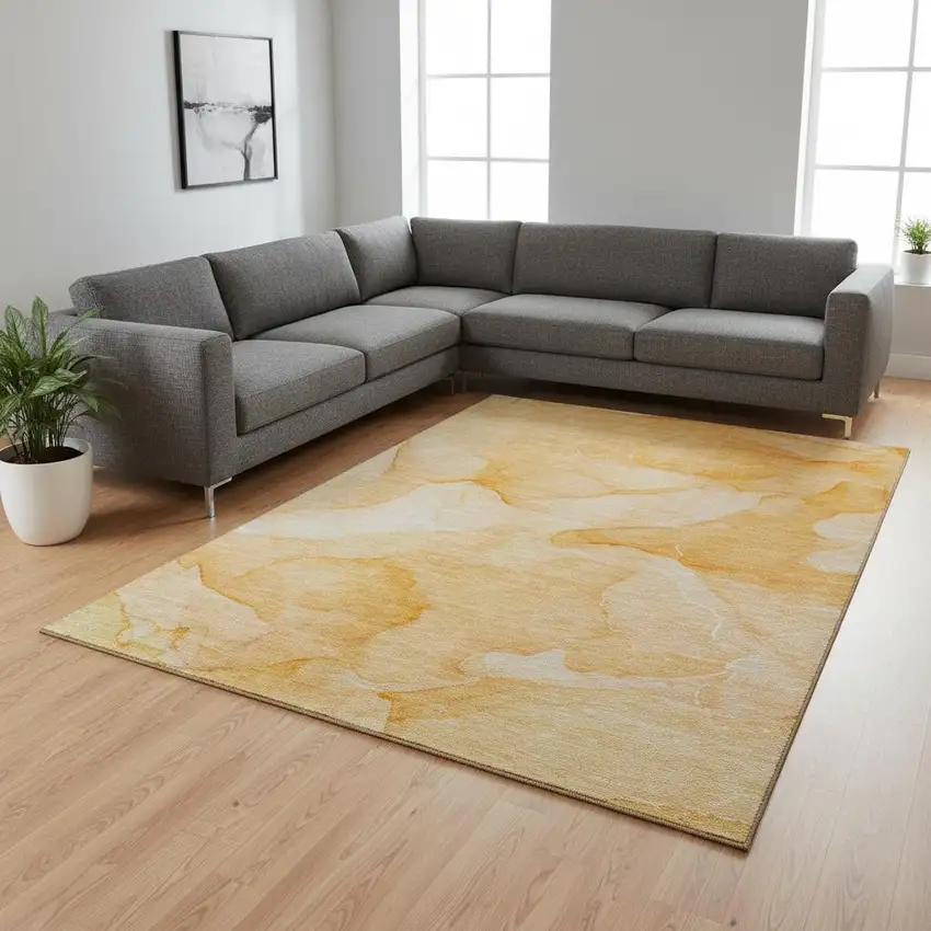 Orange And Ivory Abstract Washable Area Rug With UV Protection Photo 1