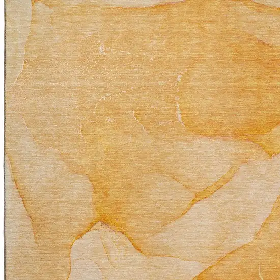 Orange And Ivory Abstract Washable Area Rug With UV Protection Photo 3
