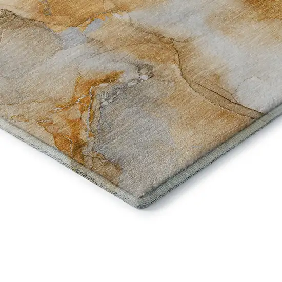 Orange And Ivory Abstract Washable Area Rug With UV Protection Photo 9