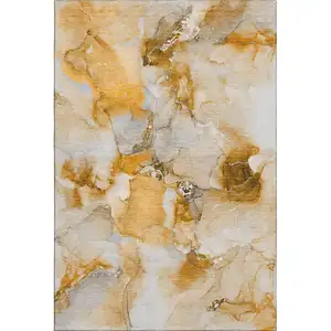 Photo of Orange And Ivory Abstract Washable Area Rug With UV Protection