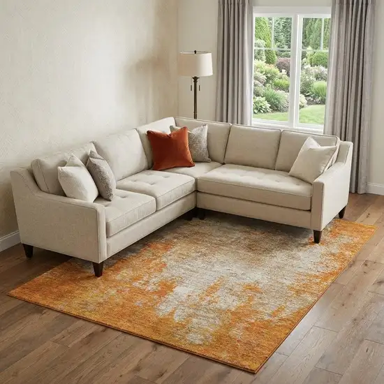 Orange And Ivory Abstract Washable Area Rug With UV Protection Photo 1