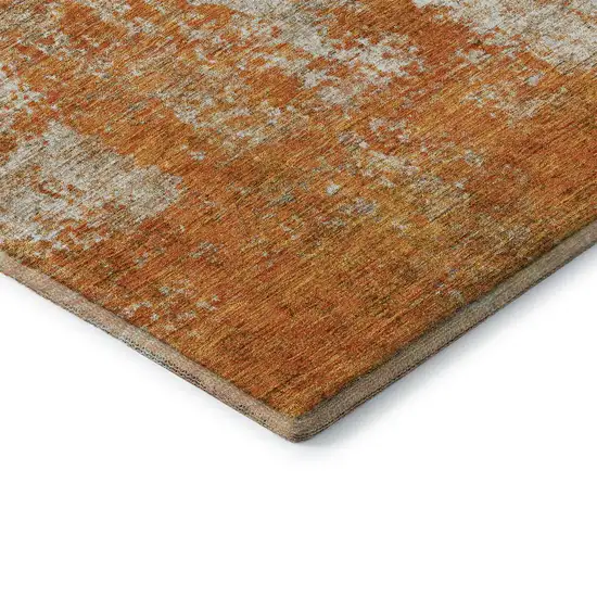 Orange And Ivory Abstract Washable Area Rug With UV Protection Photo 5
