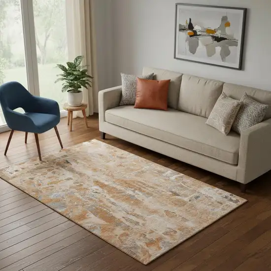 Orange And Ivory Abstract Washable Area Rug With UV Protection Photo 2