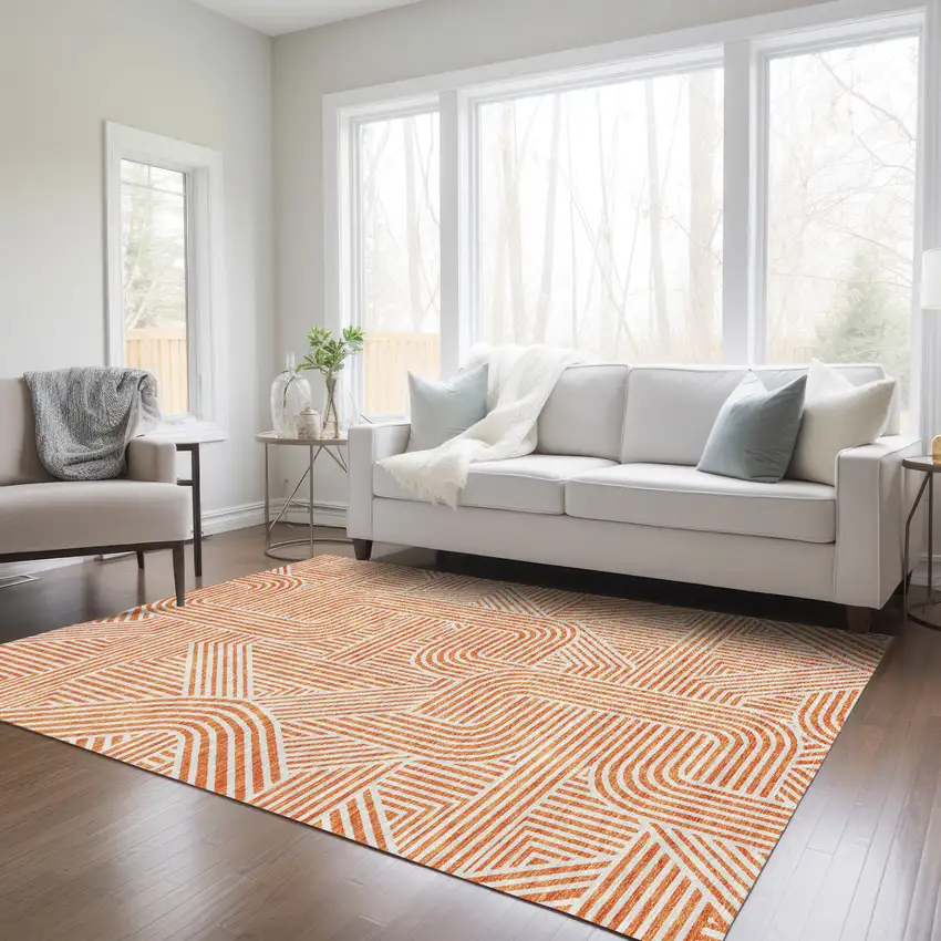 Orange And Ivory Abstract Washable Indoor Outdoor Area Rug Photo 9