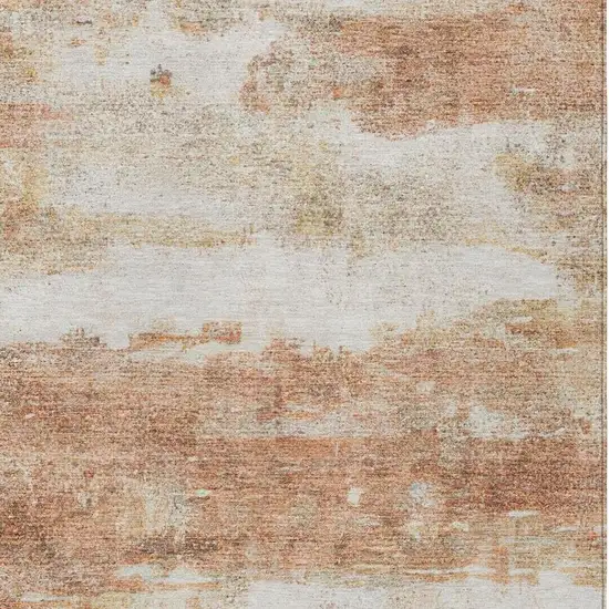 Orange And Ivory Abstract Washable Indoor Outdoor Area Rug Photo 4