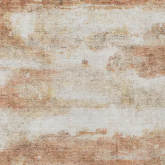 Orange And Ivory Abstract Washable Indoor Outdoor Area Rug Photo 9