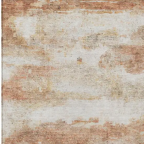 Orange And Ivory Abstract Washable Indoor Outdoor Area Rug Photo 7