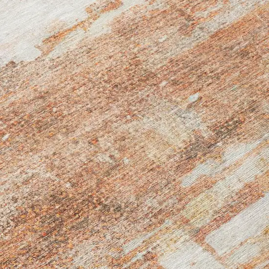 Orange And Ivory Abstract Washable Indoor Outdoor Area Rug Photo 5