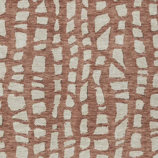 Orange And Ivory Abstract Washable Indoor Outdoor Area Rug Photo 4
