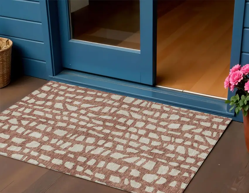 Orange And Ivory Abstract Washable Indoor Outdoor Area Rug Photo 1