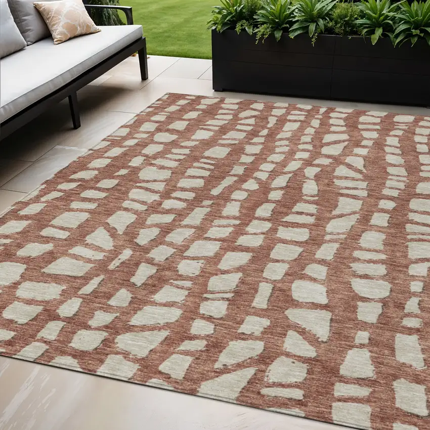 Orange And Ivory Abstract Washable Indoor Outdoor Area Rug Photo 1