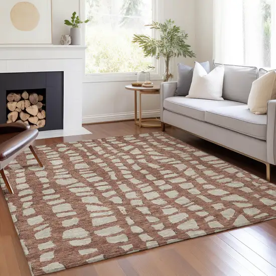 Orange And Ivory Abstract Washable Indoor Outdoor Area Rug Photo 7