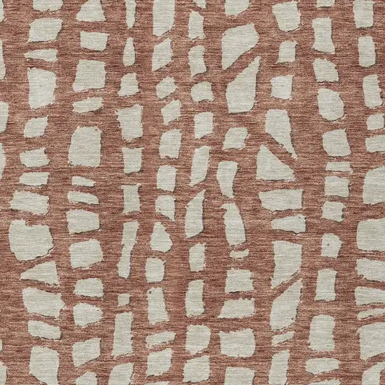 Orange And Ivory Abstract Washable Indoor Outdoor Area Rug Photo 4