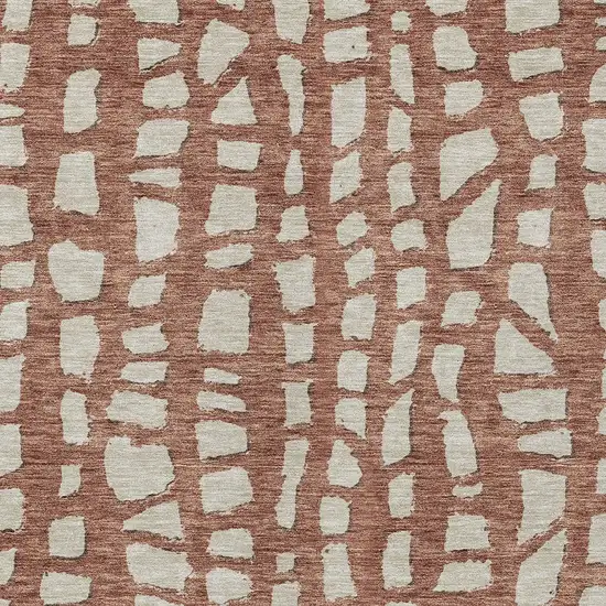 Orange And Ivory Abstract Washable Indoor Outdoor Area Rug Photo 4