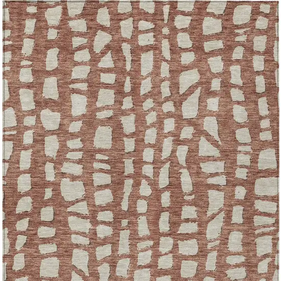 Orange And Ivory Abstract Washable Indoor Outdoor Area Rug Photo 4