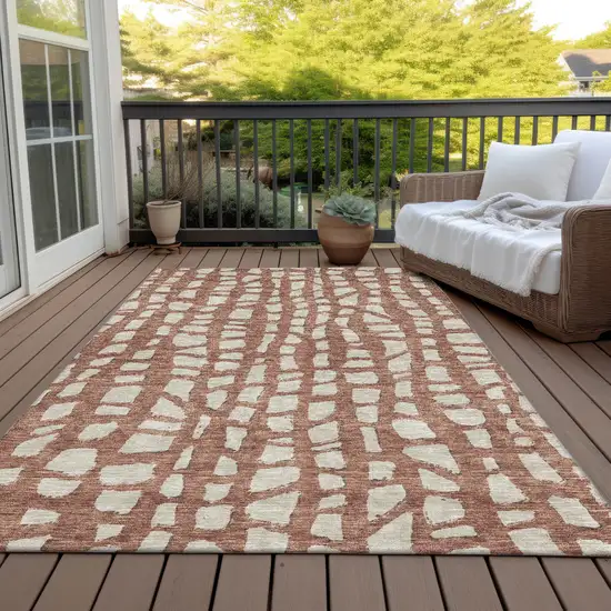 Orange And Ivory Abstract Washable Indoor Outdoor Area Rug Photo 6