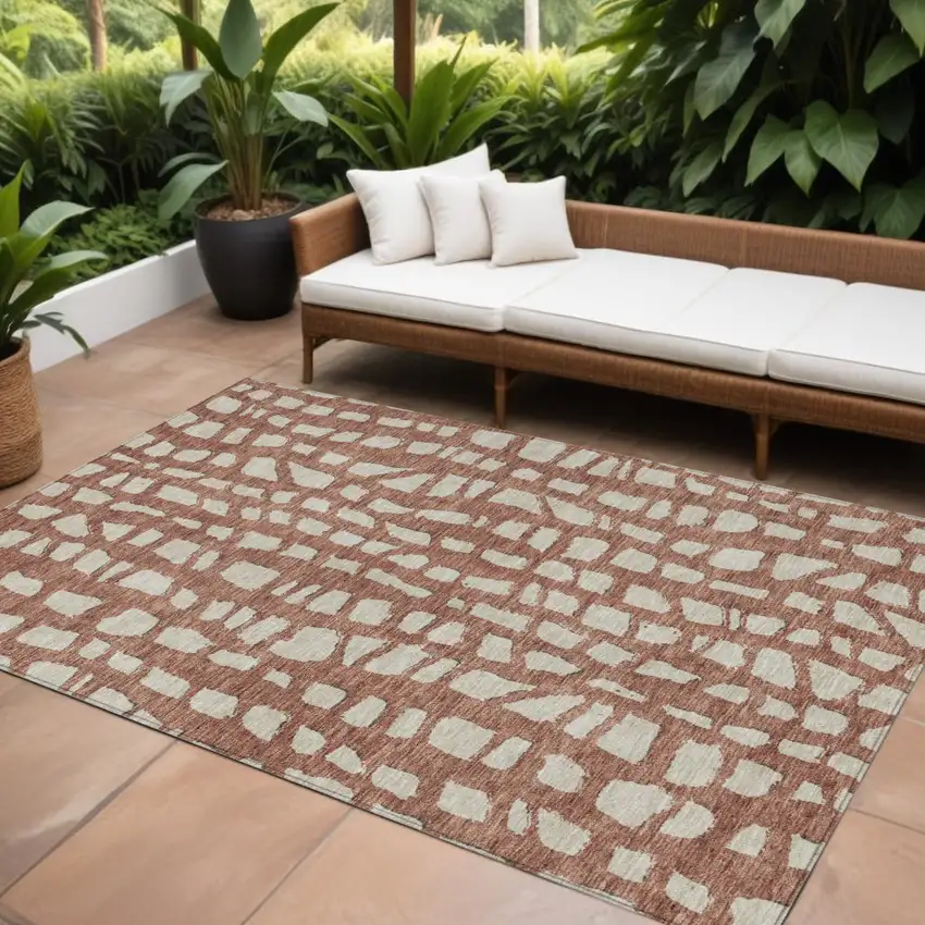 Orange And Ivory Abstract Washable Indoor Outdoor Area Rug Photo 1
