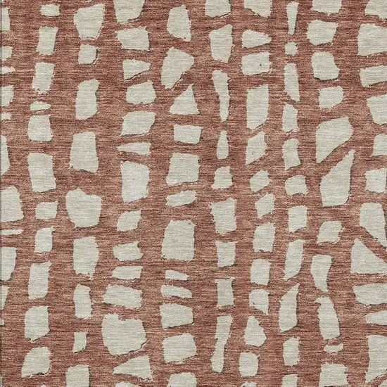 Orange And Ivory Abstract Washable Indoor Outdoor Area Rug Photo 4