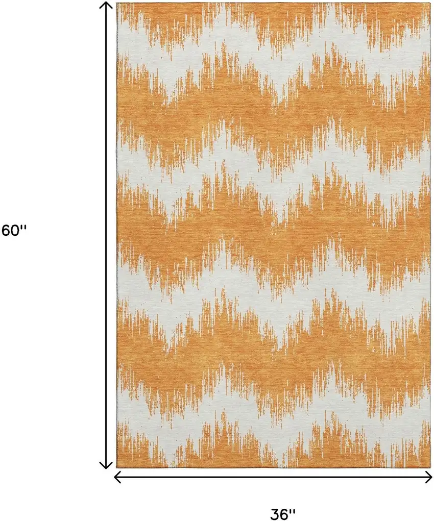 Orange And Ivory Chevron Washable Area Rug With UV Protection Photo 3