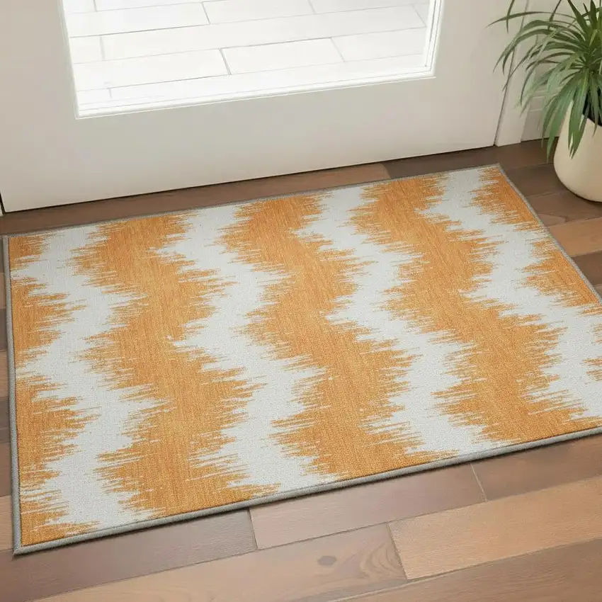 Orange And Ivory Chevron Washable Area Rug With UV Protection Photo 2