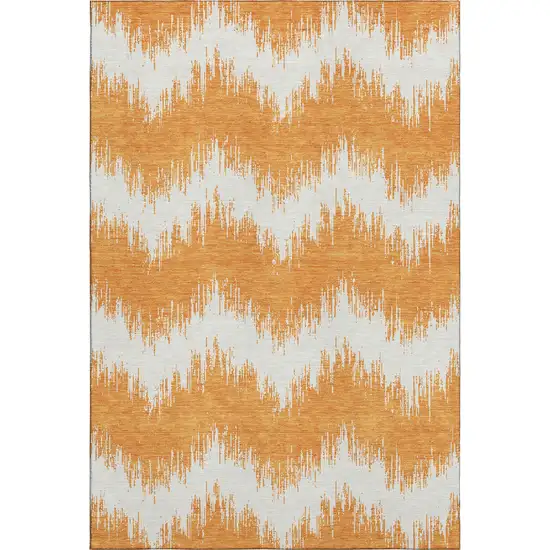 Orange And Ivory Chevron Washable Area Rug With UV Protection Photo 1
