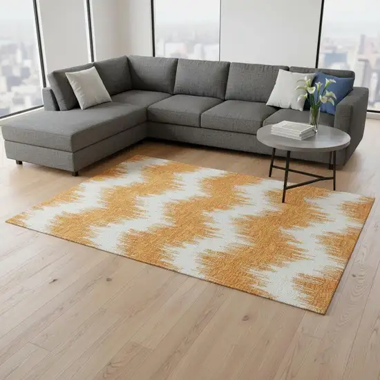 Orange And Ivory Chevron Washable Area Rug With UV Protection Photo 2