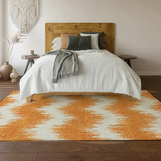 Orange And Ivory Chevron Washable Area Rug With UV Protection Photo 6