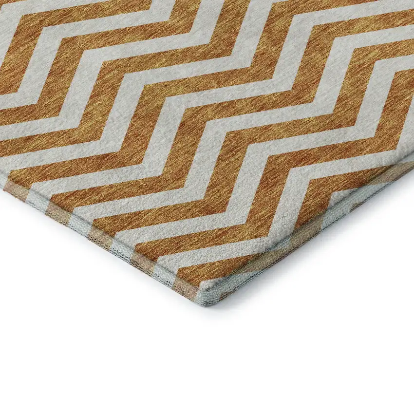 Orange And Ivory Chevron Washable Area Rug With UV Protection Photo 7