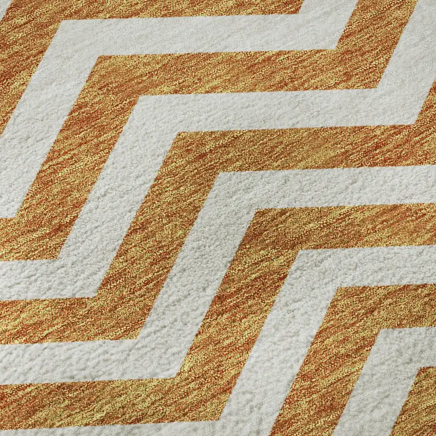 Orange And Ivory Chevron Washable Area Rug With UV Protection Photo 9