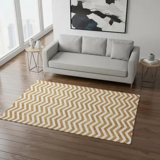 Orange And Ivory Chevron Washable Area Rug With UV Protection Photo 2