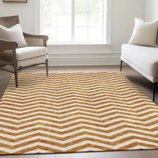 Orange And Ivory Chevron Washable Area Rug With UV Protection Photo 6