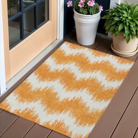 Orange And Ivory Chevron Washable Indoor Outdoor Area Rug Photo 1