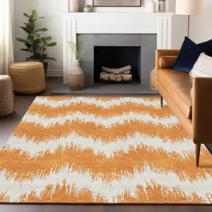 Photo of Orange And Ivory Chevron Washable Indoor Outdoor Area Rug