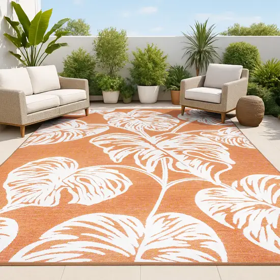 Orange And Ivory Floral Indoor Outdoor Area Rug Photo 4