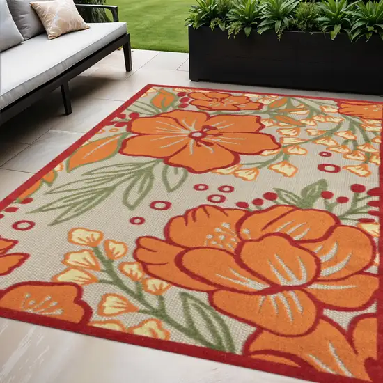 Orange And Ivory Handmade Indoor Outdoor Area Rug Photo 1