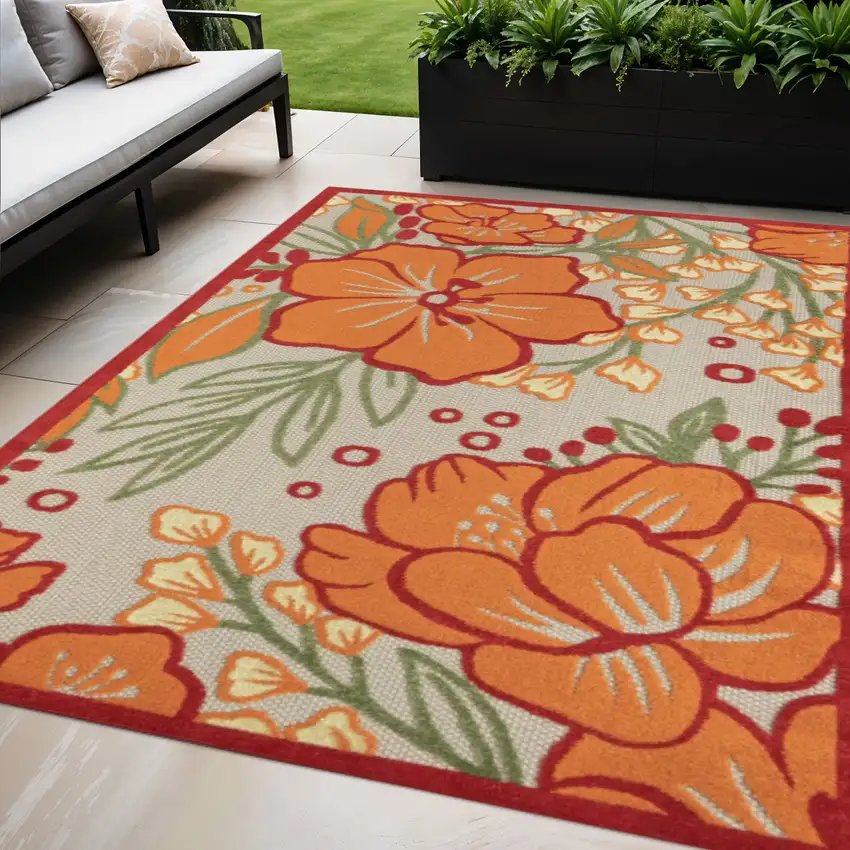Orange And Ivory Handmade Indoor Outdoor Area Rug Photo 1