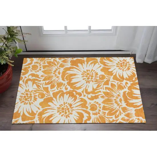 Orange And Ivory Floral Washable Area Rug With UV Protection Photo 2