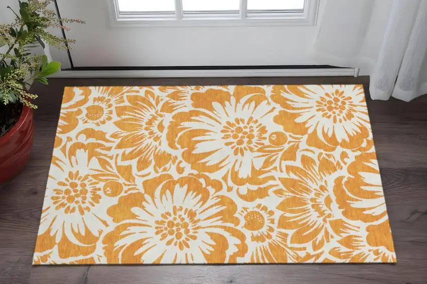 Orange And Ivory Floral Washable Area Rug With UV Protection Photo 2
